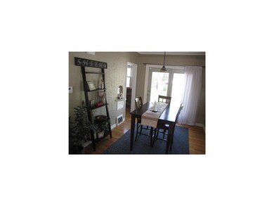 Dining Area. The dining room is open to the living