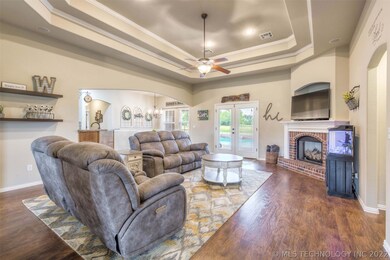 Open floor plan, gas log fireplace, high ceilings,