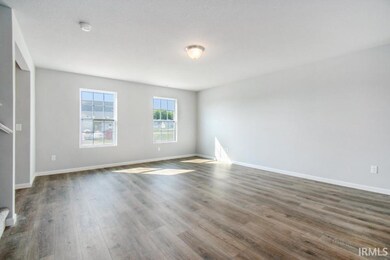 The large great room has an abundance of natural l