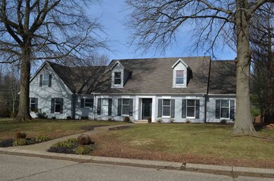 Large front yard with pool in back fenced yard.