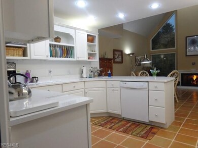 Kitchen with lovely white cabinets, all appliances