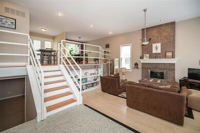Contemporary Floor plan with lots of natural light and soaring ceilings.