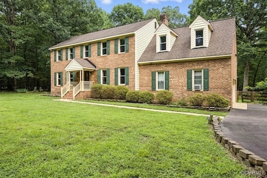 This stunning colonial-style home features low-mai