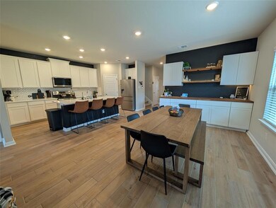 Dining room featuring recessed lighting and light