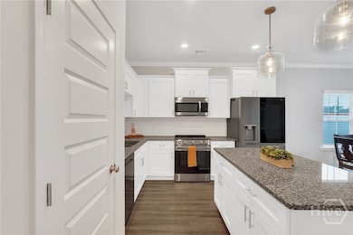 Pictures are of Model Home, features and colors may vary.