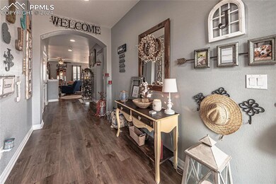 Hallway featuring dark hardwood / wood-style floor
