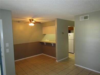Kitchen with a kitchen breakfast bar, ceiling fan