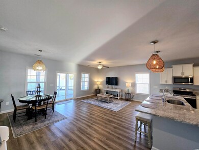 Spacious living and dining with open floor plan.
