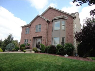 Exterior Front. The quoined corners and rock mulch are just a few of the outstanding upgrades this home offers.