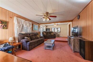 The sunken living room can be configured to meet y