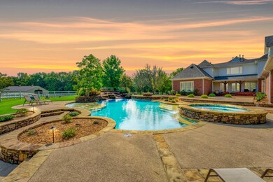 Experience luxury living with a heated gunite pool