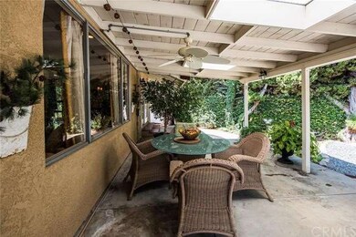 Backyard patio provides plenty of covered space pe