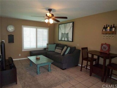 Open family room and dining area with lighted ceil