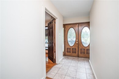 Ceramic tile entry offers easy clean-up on wet or