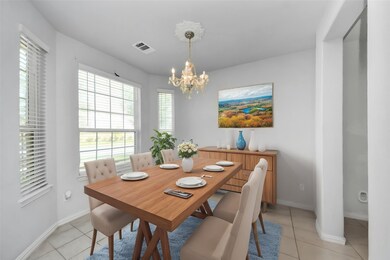 Charming single-story brick home with a two-car ga