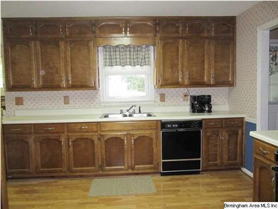 Notice the laminate flooring