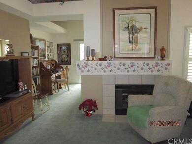 living room with double sided fireplace