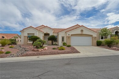 Mediterranean / spanish house featuring driveway,