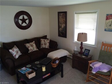Large living room in unit #2. Unit number one iden