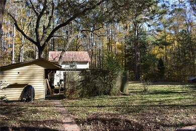 Another view of shed and barn.