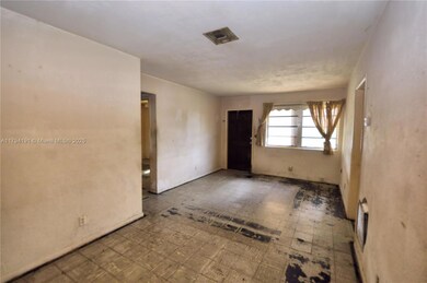 View to front door & living room