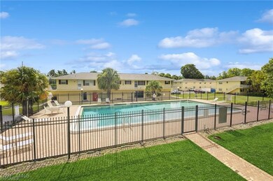 View of pool with a yard and a patio area