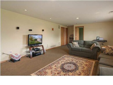 Family room is wired for surround sound.