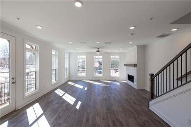 As you reach the main floor, you are instantly drawn to all the windows and the open family room, dining and kitchen.