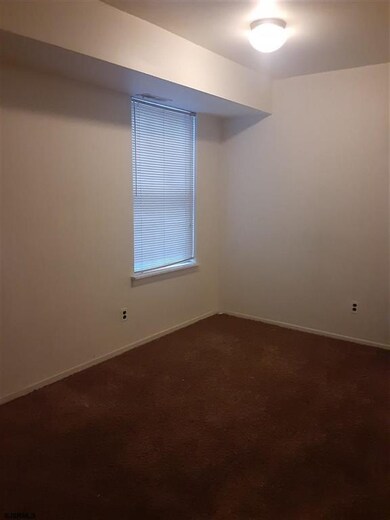 Dining Area with window and open pass through to k