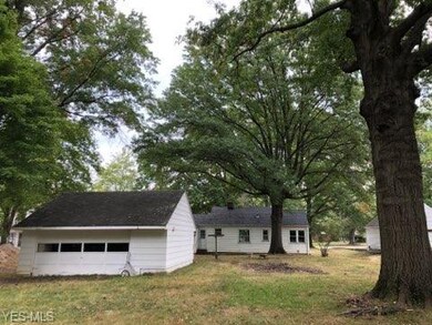 Extra large 2 + car garage with front & back garag
