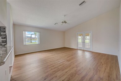 Great room/dining room from front entryway.