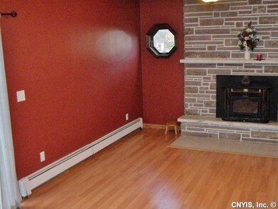 Family Room Family room with wood burning fireplac