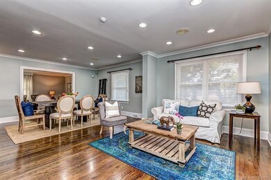 Sitting area off the kitchen is open to the dining