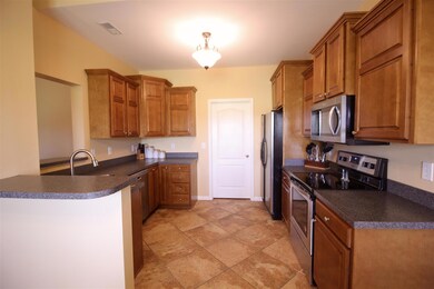 Nice tile flooring and stainless steel appliances  11x12