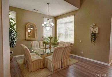 Formal dining, new flooring.