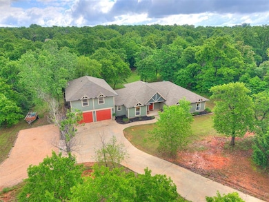 View from above of property featuring a forest