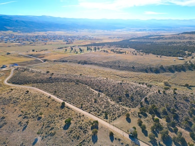 Aerial view of sparsely populated area with mountains