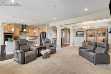 Open concept main level living area... great room, kitchen, and office space in corner.