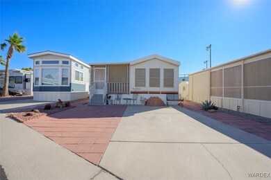 Manufactured home with a screened patio