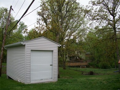 8' x 16' Storage shed with new gutters (notice the