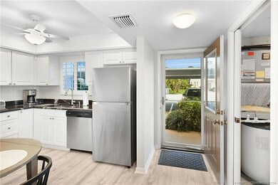 Front Door Entry Area with Kitchen on Left