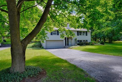 Surrounded by gardens, this house is located right
