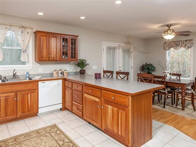 The kitchen offers tile flooring...