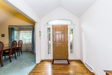 This inviting entry and great room stands tall wit
