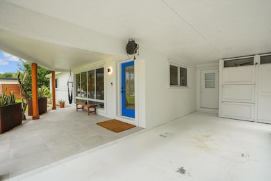 COVERED CARPORT WITH STORAGE