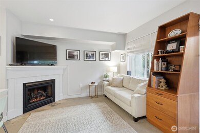 Studio with cozy electric fireplace.