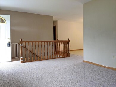 Decorative Oak railing for basement stairs.