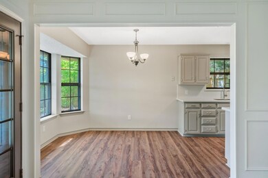 Unfurnished dining area featuring a notable chande