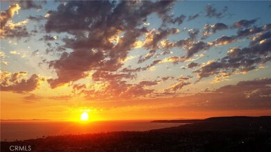Sunset between Catalina Island and Dana Point Harbor