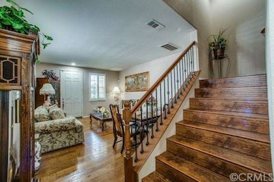 2nd view of the stairway looking towards the formal living and dining room